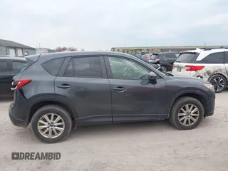 2015 Mazda CX-5 Touring with VIN JM3KE4CY1F0439016, listed as a IAAI auction lot 42039259 with 201,325 mi miles and . Bid and sale history available at carsss.com. Image 13.