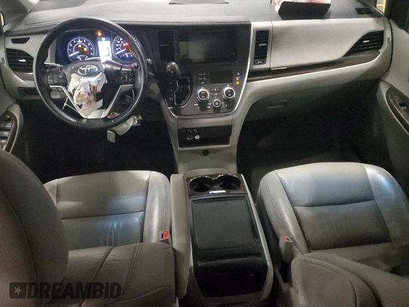 2017 Toyota Sienna XLE with VIN 5TDDZ3DC4HS166141, listed as a Copart auction lot 64357715 with 124,184 mi miles and Salvage title. Bid and sale history available at DreamBid. Image 8.