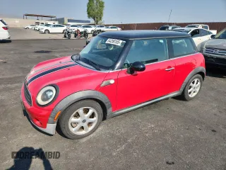 2009 MINI Hardtop with VIN WMWMF33519TW70402, listed as a Copart auction lot 64258155 with 102,820 mi miles and Salvage title. Bid and sale history available at DreamBid. Image 1.