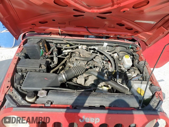 2009 Jeep Wrangler X with VIN 1J4FA24189L776078, listed as a Copart auction lot 57902705 with 104,994 mi miles and Salvage title. Bid and sale history available at DreamBid. Image 12.