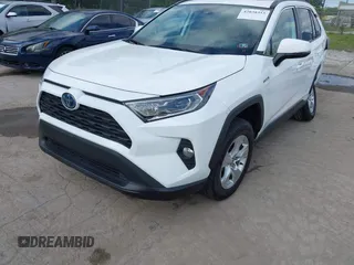 2021 Toyota RAV4 Hybrid XLE with VIN 2T3RWRFV6MW114082, listed as a IAAI auction lot 42038315 with 50,009 mi miles. Bid and sale history available at carsss.com. Image 2.