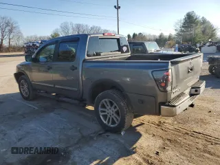 2015 Nissan Titan SV with VIN 1N6AA0EC5FN501124, listed as a Copart auction lot 87291164 with 195,448 mi miles and Salvage title. Bid and sale history available at DreamBid. Image 2.