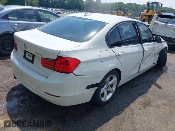 2014 BMW 3 Series 328i with VIN WBA3C1C5XEK107826, listed as a IAAI auction lot 42481701 with 104,151 mi miles and . Bid and sale history available at DreamBid. Image 4.