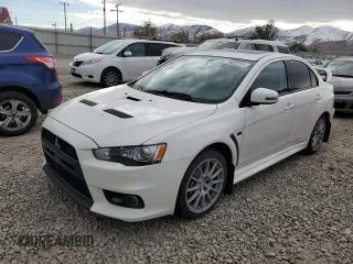 2015 Mitsubishi Lancer Evolution GSR with VIN JA32W8FV3FU604232, listed as a Copart auction lot 76823724 with 111,950 mi miles and Salvage Title. Bid and sale history available at carsss.com. Image 1.