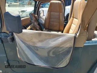 1994 Jeep Wrangler с VIN 1J4FY29S4RP467813, выставлен на аукционе Copart как лот 62484855 с пробегом 213 872 миль миль и Чистый • Clean title. История ставок и продаж доступна на DreamBid. Изображение 7.