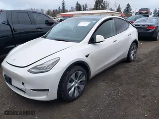 2021 Tesla Model Y Standard Range with VIN 5YJYGDED0MF133303, listed as a IAAI auction lot 41355417 with 89,766 mi miles. Bid and sale history available at carsss.com. Image 20.