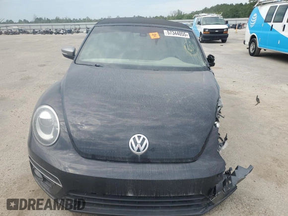 2014 Volkswagen Beetle 1.8T w/Premium z VIN 3VW517AT6EM816698, wystawiony jako Copart lot #57344055 z przebiegiem 52 782 mil mil oraz Szkoda całkowita • Salvage title. Historia ofert i sprzedaży dostępna na DreamBid. Obrazek 5.