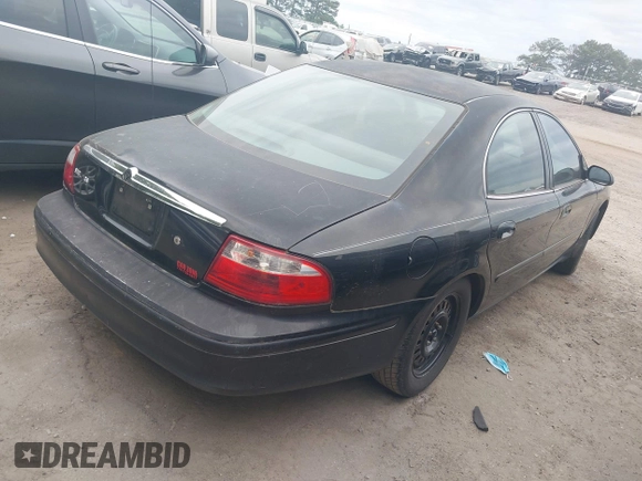 2004 Mercury Sable GS with VIN 1MEFM50U34G613224, listed as a IAAI auction lot 42079216 with 202,360 mi miles. Bid and sale history available at carsss.com. Image 4.