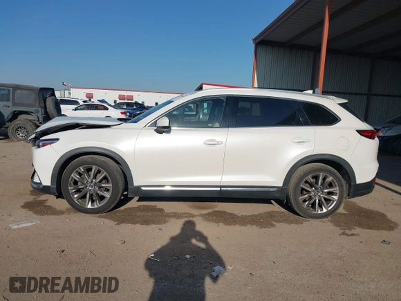 2016 Mazda CX-9 Grand Touring z VIN JM3TCADY6G0125547, wystawiony jako IAAI lot #41997445 z przebiegiem 129 179 mil mil oraz . Historia ofert i sprzedaży dostępna na DreamBid. Obrazek 14.