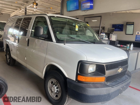 2014 Chevrolet Express Cargo with VIN 1GCWGFCA2E1184095, listed as a IAAI auction lot 42725036 with 270,636 mi miles and . Bid and sale history available at DreamBid. Image 2.