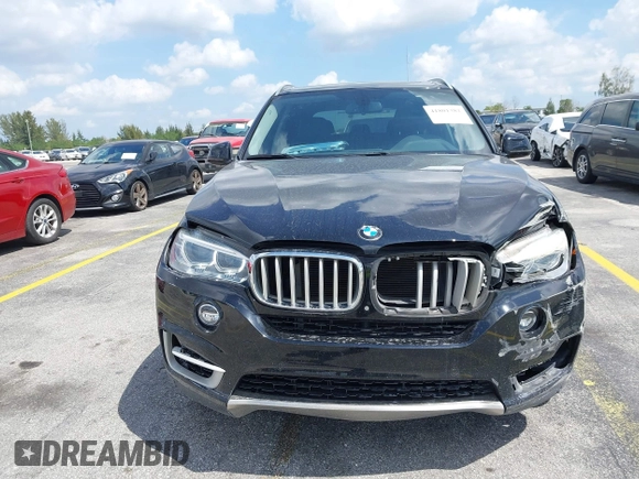 2016 BMW X5 xDrive50i with VIN 5UXKR6C51G0J81658, listed as a IAAI auction lot 41801382 with 34,572 mi miles. Bid and sale history available at carsss.com. Image 13.