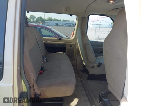 2013 Ford Econoline Passenger XL z VIN 1FBNE3BL6DDA78219, wystawiony jako IAAI lot #42511510 z przebiegiem 279 865 mil mil oraz . Historia ofert i sprzedaży dostępna na DreamBid. Obrazek 8.