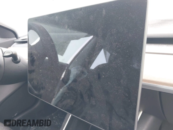 2018 Tesla Model 3 Long Range Battery with VIN 5YJ3E1EB2JF089006, listed as a IAAI auction lot 41186372 with Not Provided miles and . Bid and sale history available at DreamBid. Image 17.