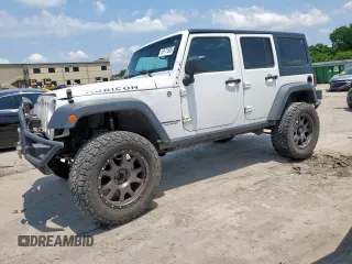2013 Jeep Wrangler Unlimited Rubicon with VIN 1C4BJWFG2DL575167, listed as a Copart auction lot 59171535 with 119,682 mi miles and Salvage title. Bid and sale history available at DreamBid. Image 1.