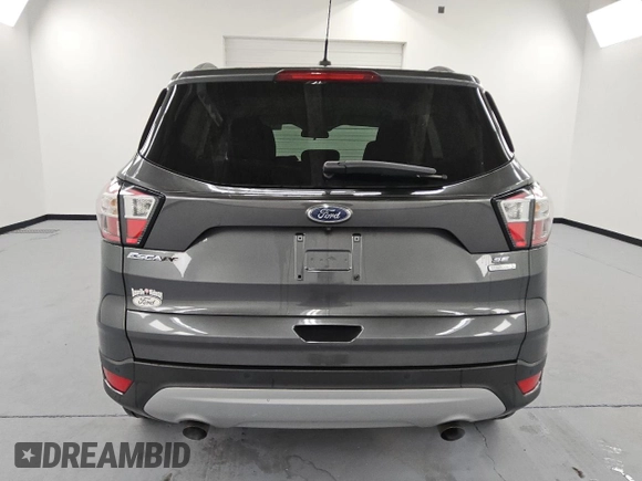 2018 Ford Escape SE with VIN 1FMCU0GD6JUA74555, listed as a Copart auction lot 54448535 with 114,848 mi miles and Clean Title. Bid and sale history available at carsss.com. Image 6.