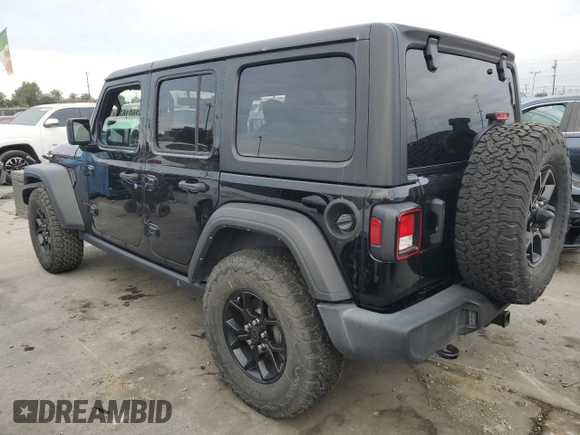 2022 Jeep Wrangler Unlimited High Tide with VIN 1C4HJXDG4NW179888, listed as a Copart auction lot 82601624 with 15,631 mi miles and Salvage Title. Bid and sale history available at DreamBid. Image 2.