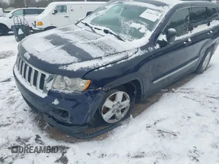 2013 Jeep Grand Cherokee Laredo with VIN 1C4RJFAGXDC542987, listed as a IAAI auction lot 41262770 with 199,273 mi miles. Bid and sale history available at carsss.com. Image 6.