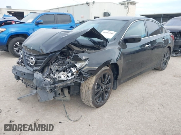 2018 Nissan Altima 2.5 SR with VIN 1N4AL3AP3JC298848, listed as a IAAI auction lot 40966335 with 121,163 mi miles. Bid and sale history available at carsss.com. Image 18.