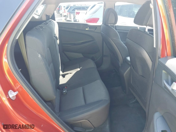 2017 Hyundai Tucson SE Plus with VIN KM8J33A40HU318652, listed as a IAAI auction lot 42092018 with 249,498 mi miles. Bid and sale history available at carsss.com. Image 8.