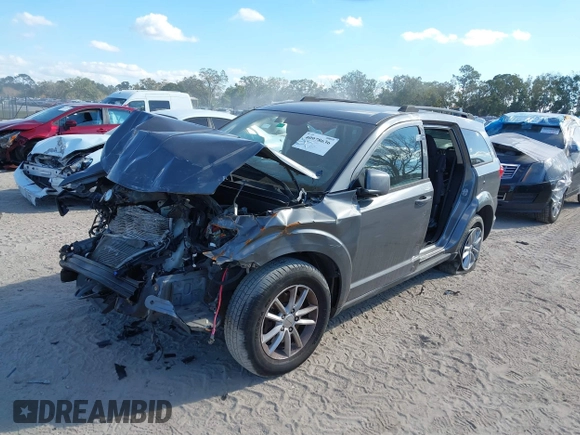 2013 Dodge Journey SXT with VIN 3C4PDCBG6DT552707, listed as a IAAI auction lot 40978636 with Not Provided miles. Bid and sale history available at carsss.com. Image 2.