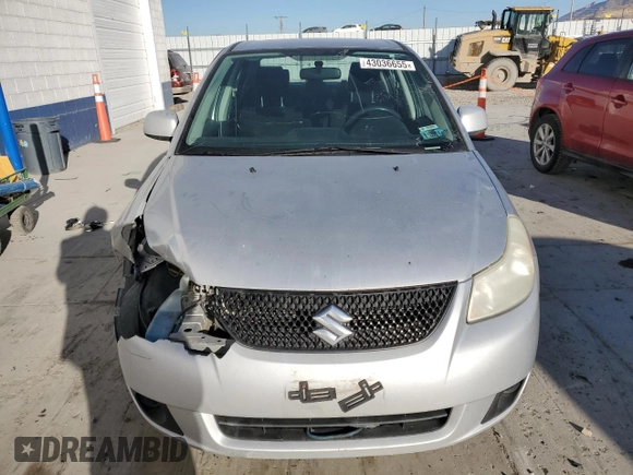 2010 Suzuki SX4 LE with VIN JS2YC5A27A6300498, listed as a Copart auction lot 43036655 with 237,647 mi miles and Salvage Title. Bid and sale history available at carsss.com. Image 5.