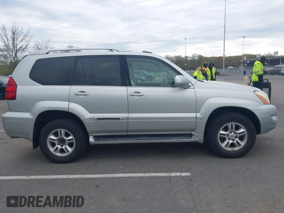 2004 Lexus GX with VIN JTJBT20X240063922, listed as a IAAI auction lot 42087170 with 251,366 mi miles. Bid and sale history available at carsss.com. Image 13.
