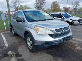 2008 Honda CR-V LX with VIN JHLRE38338C005828, listed as a IAAI auction lot 42042857 with 104,181 mi miles and . Bid and sale history available at carsss.com. Image 1.