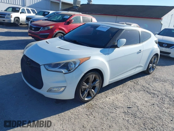 2014 Hyundai Veloster with VIN KMHTC6AD5EU193136, listed as a IAAI auction lot 41836596 with 160,460 mi miles. Bid and sale history available at carsss.com. Image 2.
