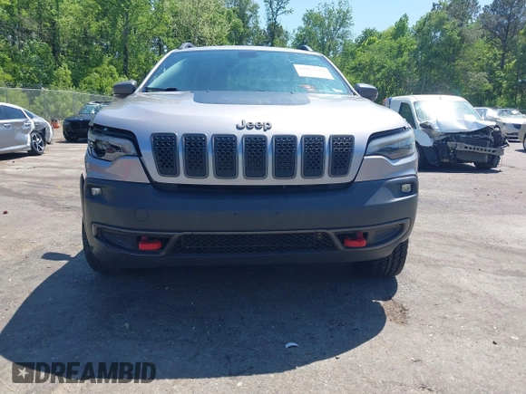 2020 Jeep Cherokee Trailhawk z VIN 1C4PJMBX1LD590087, wystawiony jako IAAI lot #42027620 z przebiegiem 91 033 mil mil oraz . Historia ofert i sprzedaży dostępna na DreamBid. Obrazek 12.