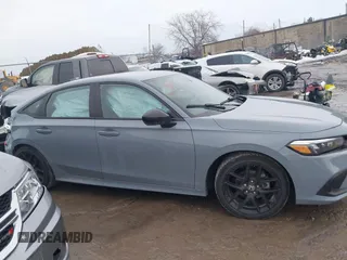 2023 Honda Civic Sport z VIN 2HGFE2F56PH567170, wystawiony jako IAAI lot #41700433 z przebiegiem 38 877 mil mil oraz . Historia ofert i sprzedaży dostępna na DreamBid. Obrazek 13.
