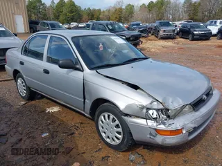 1994 Toyota Corolla with VIN JT2AE04B3R0080434, listed as a IAAI auction lot 41706199 with 119,643 mi miles and . Bid and sale history available at DreamBid. Image 1.