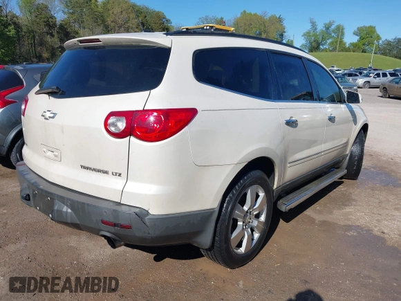2011 Chevrolet Traverse LTZ with VIN 1GNKVLED9BJ158896, listed as a IAAI auction lot 42023356 with 203,809 mi miles and . Bid and sale history available at DreamBid. Image 4.