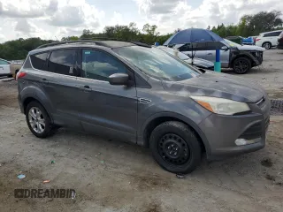 2013 Ford Escape SE with VIN 1FMCU9G9XDUB35233, listed as a Copart auction lot 51359435 with 228,354 mi miles and Clean Title. Bid and sale history available at carsss.com. Image 4.