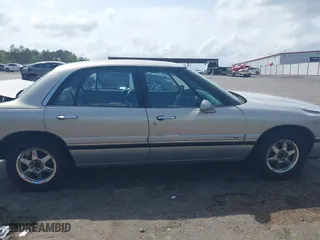 1998 Buick LeSabre Custom with VIN 1G4HP52K1WH412332, listed as a IAAI auction lot 41923320 with 201,306 mi miles. Bid and sale history available at carsss.com. Image 14.