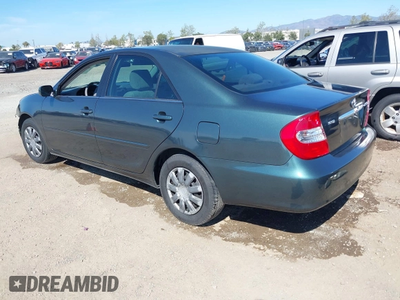 2004 Toyota Camry LE with VIN 4T1BE32K64U340905, listed as a IAAI auction lot 41992386 with 112,292 mi miles. Bid and sale history available at carsss.com. Image 3.
