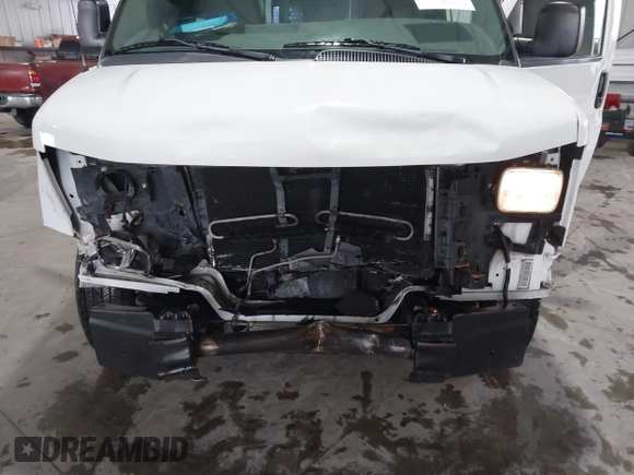 2014 Chevrolet Express Cargo Van with VIN 1GCWGFCA0E1138684, listed as a IAAI auction lot 41796495 with 101,756 mi miles. Bid and sale history available at carsss.com. Image 6.