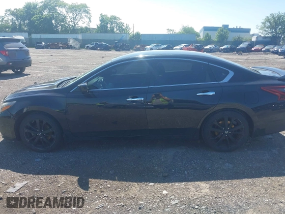 2017 Nissan Altima SV with VIN 1N4AL3AP4HC472713, listed as a IAAI auction lot 42388073 with 125,175 mi miles and . Bid and sale history available at DreamBid. Image 14.