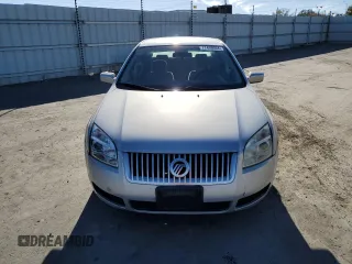 2006 Mercury Milan with VIN 3MEFM07176R612667, listed as a Copart auction lot 77498664 with 145,760 mi miles and Salvage title. Bid and sale history available at DreamBid. Image 5.