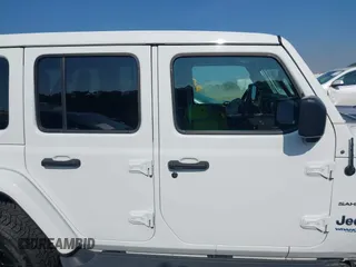 2021 Jeep Wrangler Unlimited Sahara z VIN 1C4JJXP6XMW840844, wystawiony jako IAAI lot #42152271 z przebiegiem 68 209 mil mil oraz . Historia ofert i sprzedaży dostępna na DreamBid. Obrazek 13.