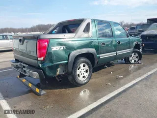 2003 Chevrolet Avalanche with VIN 3GNEK13T13G299307, listed as a IAAI auction lot 41663449 with 242,862 mi miles. Bid and sale history available at carsss.com. Image 4.