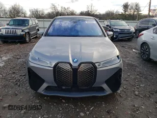 2023 BMW iX xDrive50 with VIN WB523CF03PCL64040, listed as a Copart auction lot 36400593 with 1,399 mi miles. Bid and sale history available at carsss.com. Image 5.