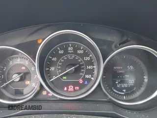 2014 Mazda 6 i Touring with VIN JM1GJ1V69E1161978, listed as a IAAI auction lot 42166649 with 127,287 mi miles. Bid and sale history available at carsss.com. Image 7.