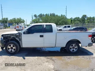 2014 Ford F-150 XL with VIN 1FTEX1CM4EFA59675, listed as a IAAI auction lot 42068873 with 205,342 mi miles. Bid and sale history available at carsss.com. Image 14.