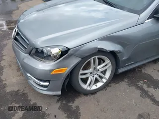 2014 Mercedes-Benz C with VIN WDDGF8AB5ER318166, listed as a IAAI auction lot 41911146 with 115,691 mi miles. Bid and sale history available at carsss.com. Image 6.