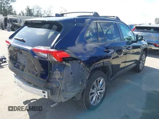 2022 Toyota RAV4 XLE Premium with VIN 2T3C1RFV2NW191537, listed as a IAAI auction lot 42245715 with 72,307 mi miles and . Bid and sale history available at DreamBid. Image 4.