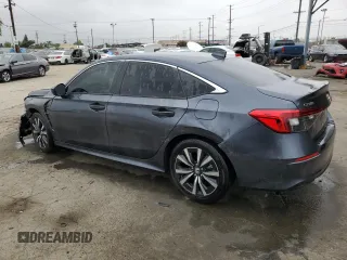 2023 Honda Civic EX z VIN 2HGFE1F72PH312995, wystawiony jako Copart lot #57284305 z przebiegiem 7 921 mil mil oraz Szkoda całkowita • Salvage title. Historia ofert i sprzedaży dostępna na DreamBid. Obrazek 2.