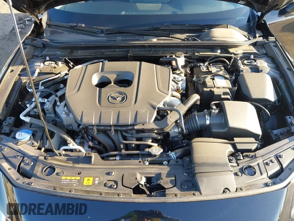2024 Mazda 3 S with VIN 3MZBPAAMXRM423154, listed as a IAAI auction lot 41969779 with 3,046 mi miles and . Bid and sale history available at DreamBid. Image 10.