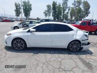 2014 Toyota Corolla L with VIN 5YFBURHE1EP063722, listed as a IAAI auction lot 42161425 with 148,227 mi miles and . Bid and sale history available at DreamBid. Image 14.