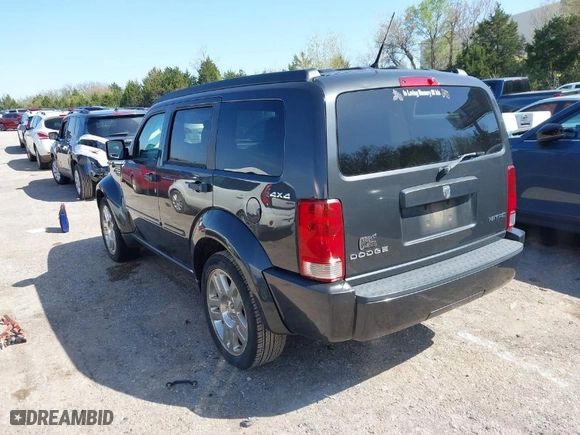 2011 Dodge Nitro Heat with VIN 1D4PU4GK6BW549562, listed as a IAAI auction lot 41992334 with 137,481 mi miles. Bid and sale history available at carsss.com. Image 3.
