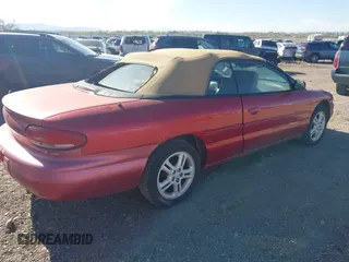 1996 Chrysler Sebring JXi with VIN 3C3EL55H0TT324666, listed as a IAAI auction lot 42102226 with 114,755 mi miles and . Bid and sale history available at DreamBid. Image 4.